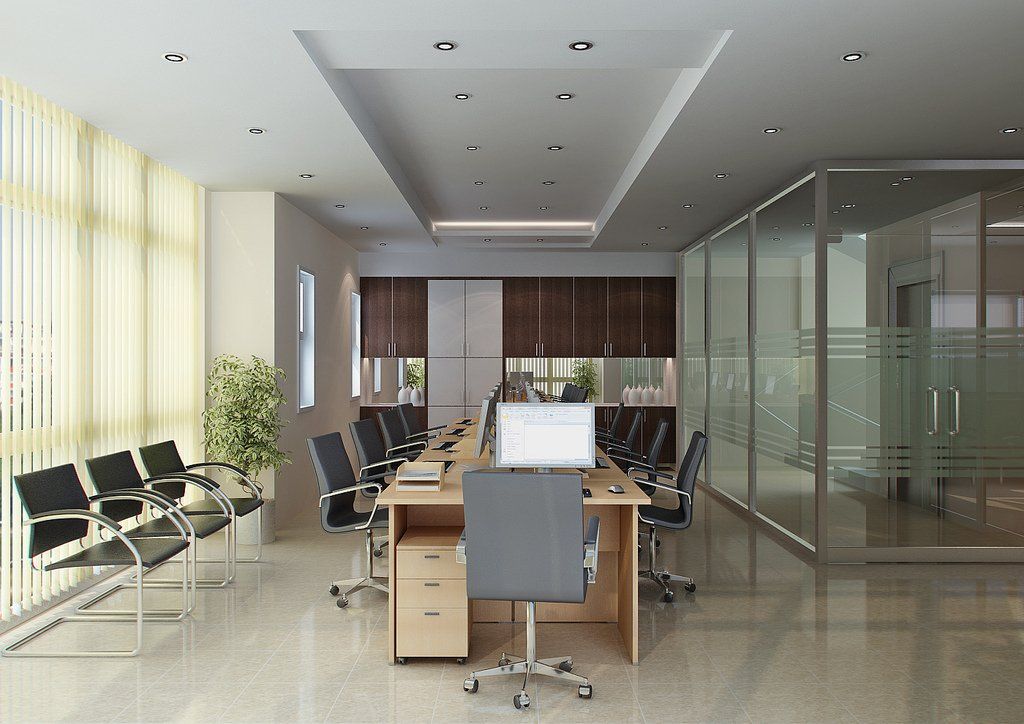 A conference room with a long table and chairs